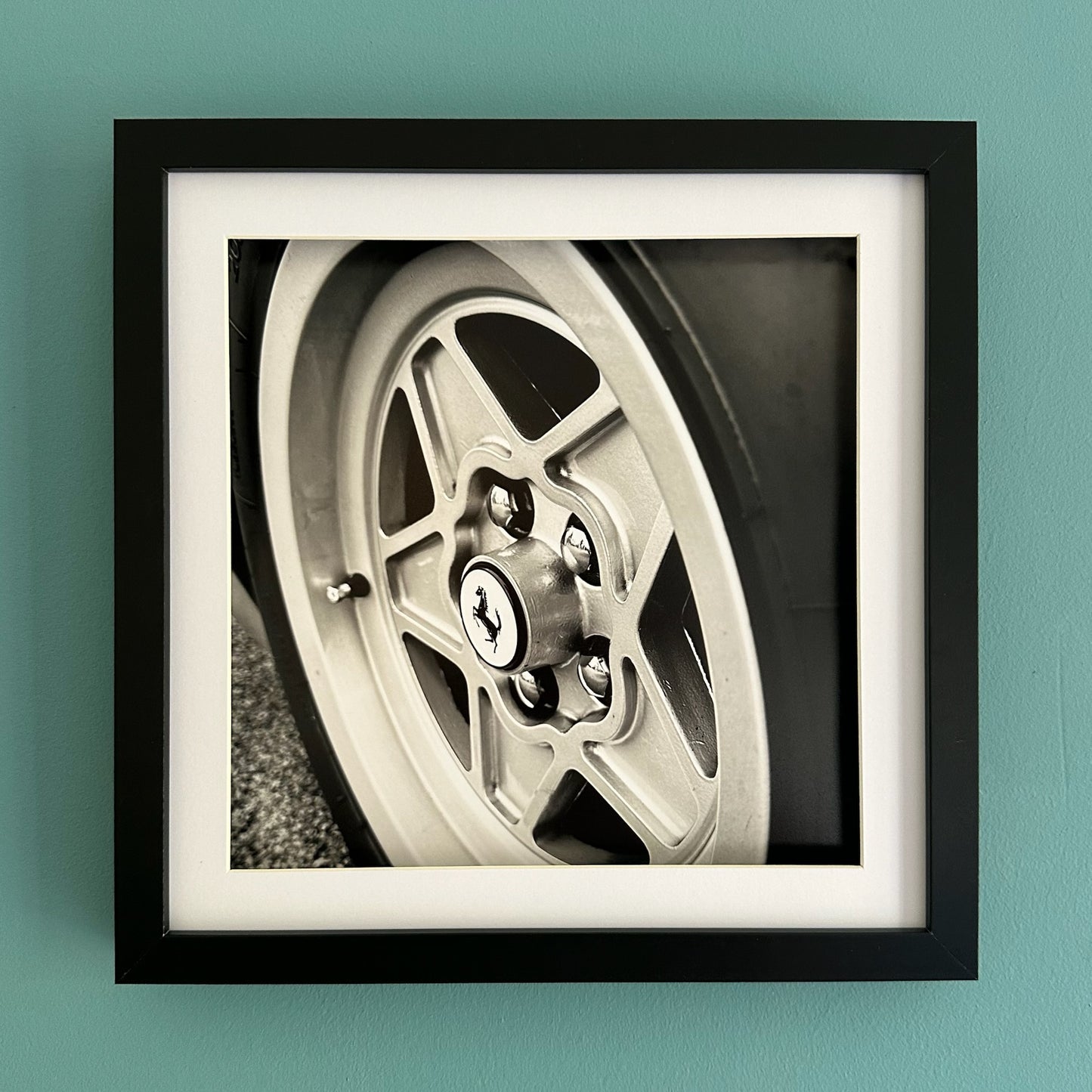 Monochrome Classic Ferrari Wheel - Black Framed Print